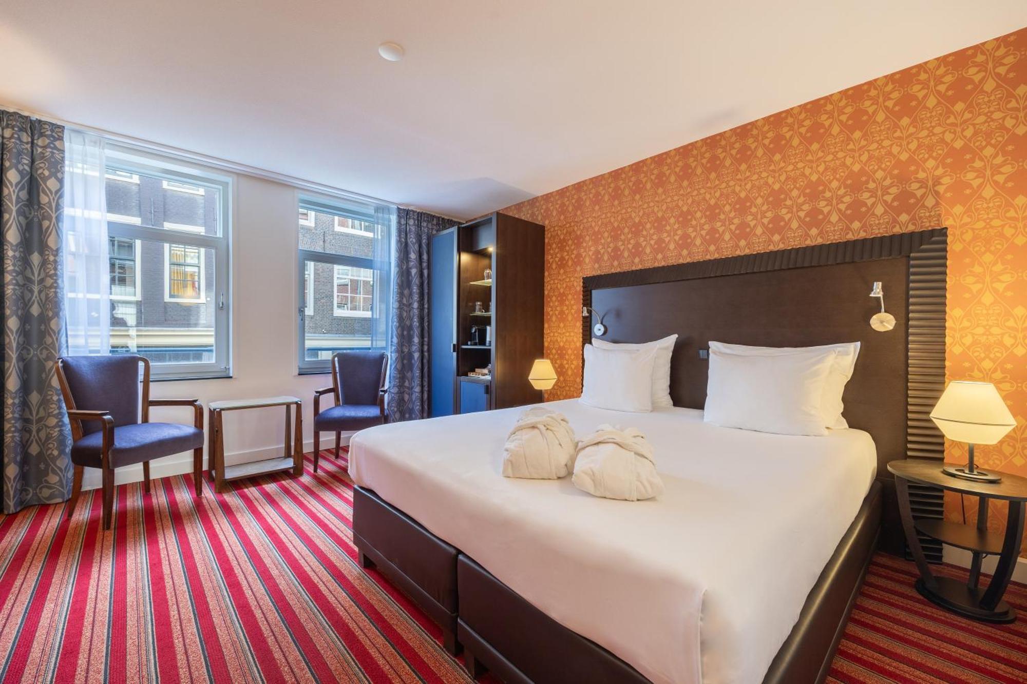 Grand Hotel Amrath Amsterdam Bagian luar foto A room at the hotel