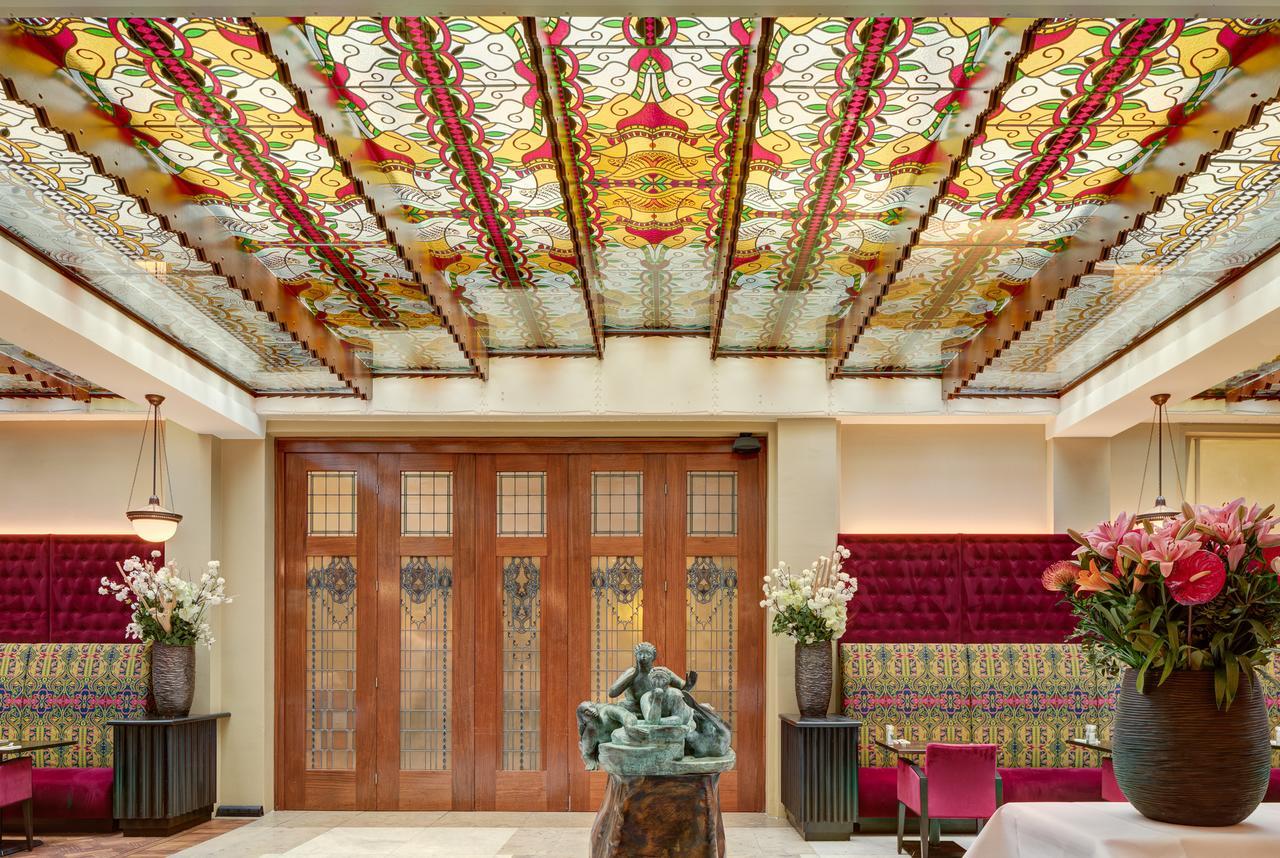 Grand Hotel Amrath Amsterdam Bagian luar foto The ceiling of the lobby